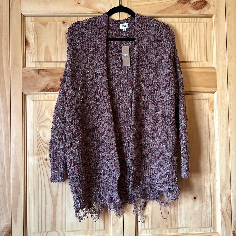 Distressed bottom cardigan